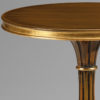 Italian Neoclassic style round carved wood table. Neoclassic table has hand-painted antiqued medium brown finish and antiqued gold-leaf accents. This occasional table is hand-crafted in Italy