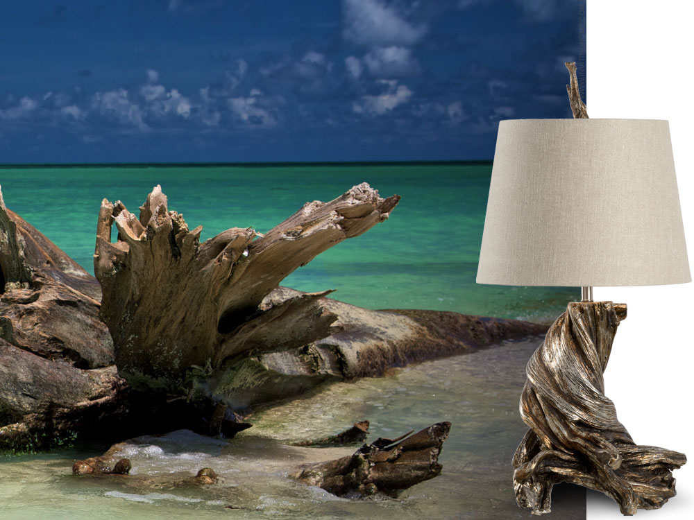 Silver-leafed driftwood lamp; The fascinating shapes of this table lamp accentuated by hand-applied antiqued silver leaf finish and carried on branch shaped finial; available at InvitingHome.com