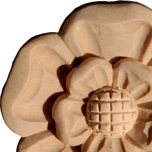Bowie wood rosettes are carved in a deep relief with flower motif