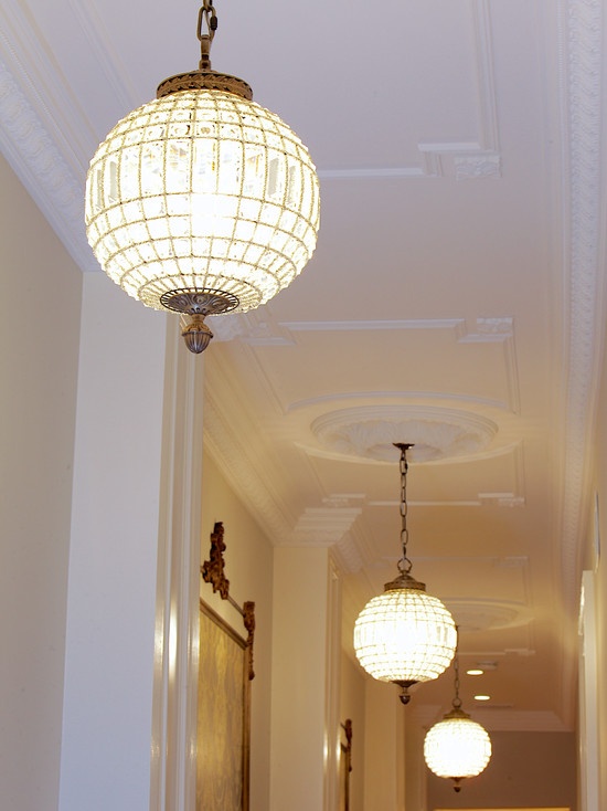Elegant ceiling design with ceiling medallions, crown moldings, panels and rosettes