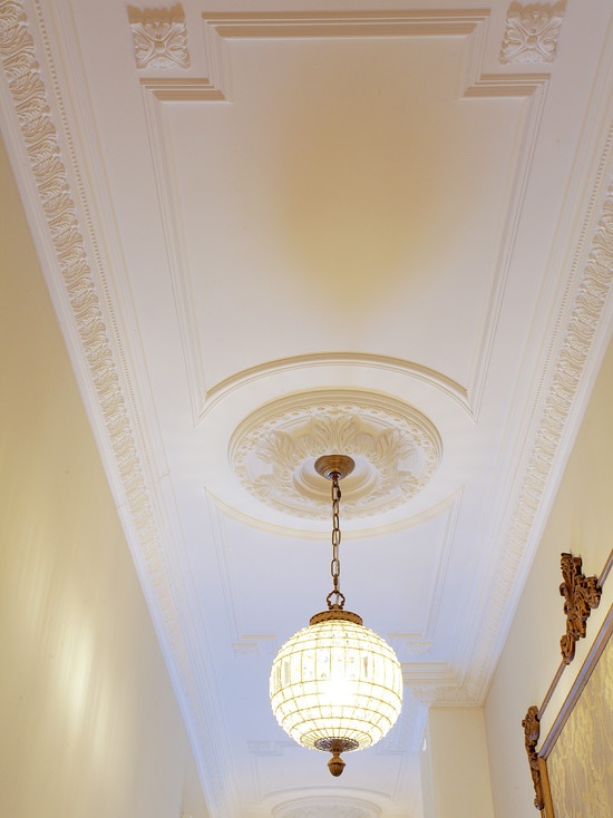 Elegant ceiling design with ceiling medallions, crown moldings, panels and rosettes