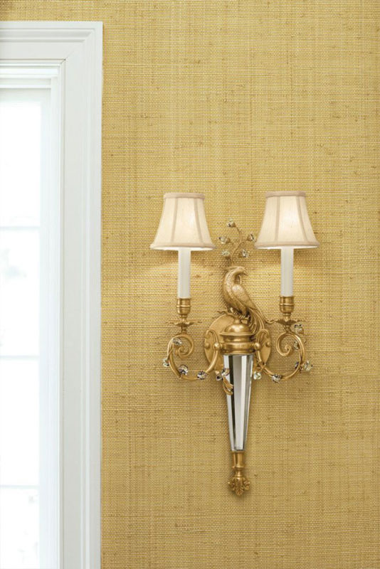 Wall decor with beautiful brass and crystal sconce with  peacock design; sconces are available at InvitingHome.com